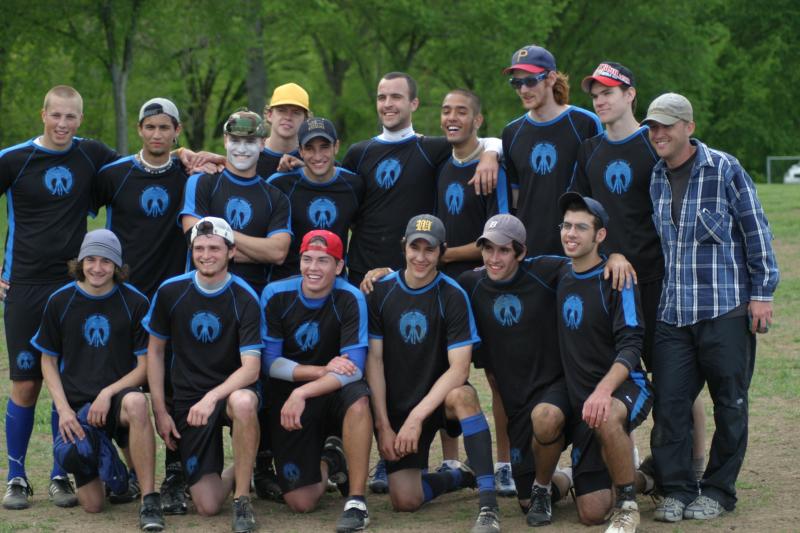 The 2005 Pitt squad, the first Pitt team to reach Nationals, posed together on the field
