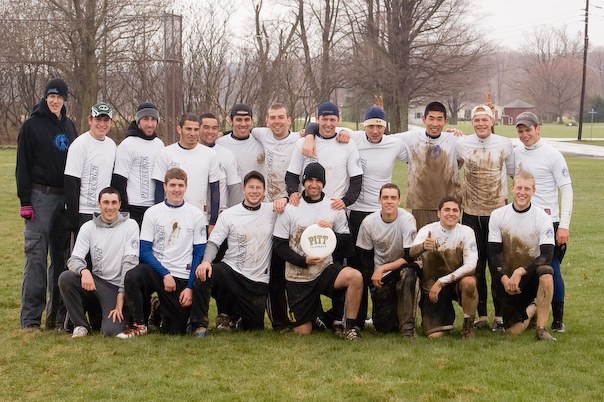 Mud-covered Pitt team photo after a wet tournament, 2007